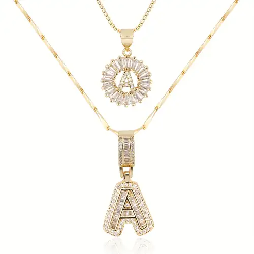 Initiale™ | Ensemble collier lettre en moissanite dorée